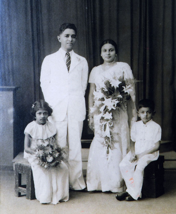 Wedding photo of Vinnie &amp;  Somi Kirtisinghe. circa 1943. Photographer unknown. Flower girl Malini and the Page boy Ranjith Ratnapala. This image reproduced from a copy by Chulie de Silva